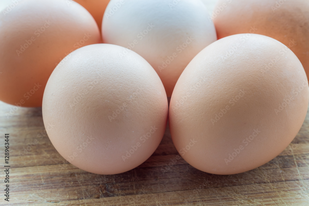 Eggs on a wooden surface Eggs on a wooden surface