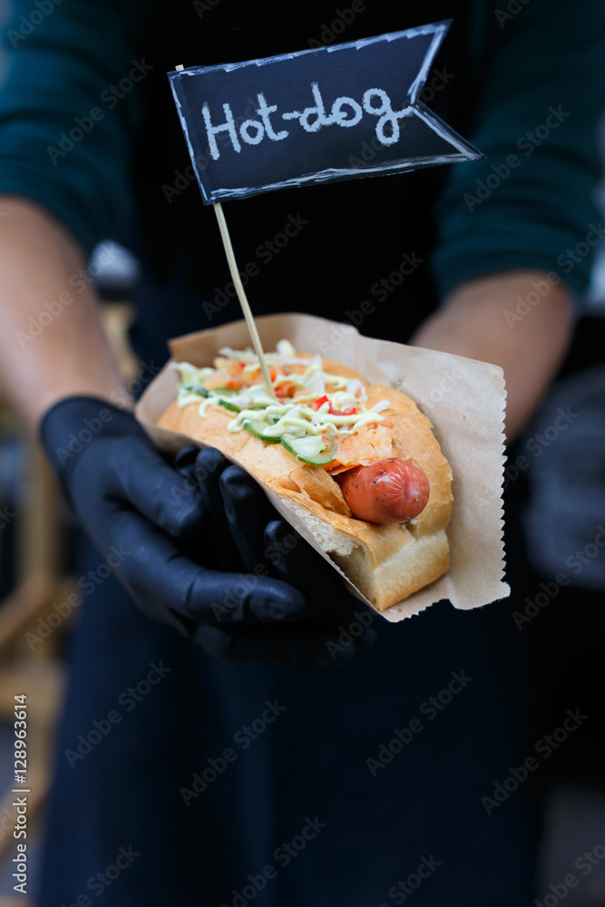 Street fast food, hot dog with grilled sausage