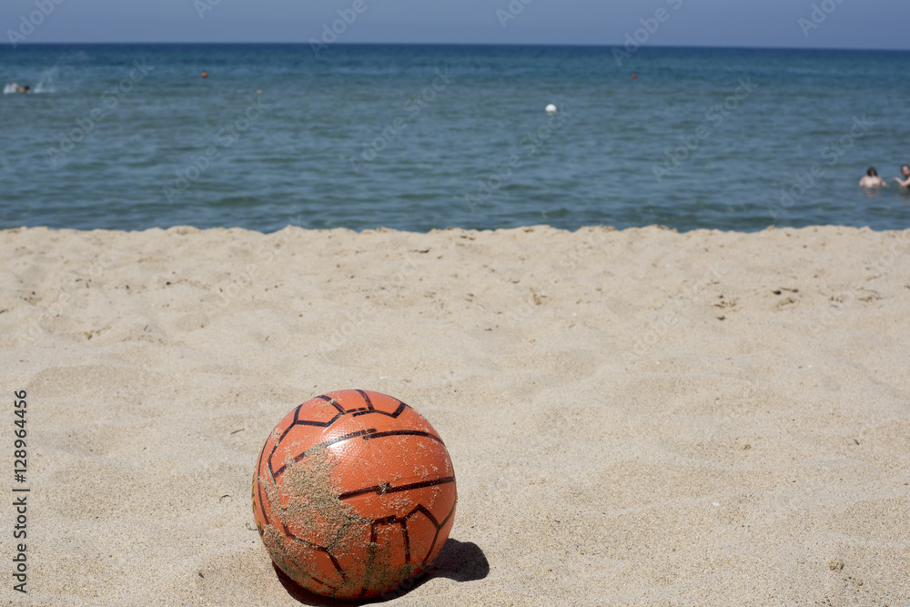 soccer ball or volleyball to play on the beach in summer