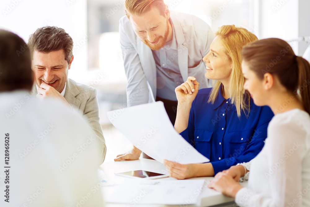 Businesspeople collaborating in office Businesspeople collaborating in office