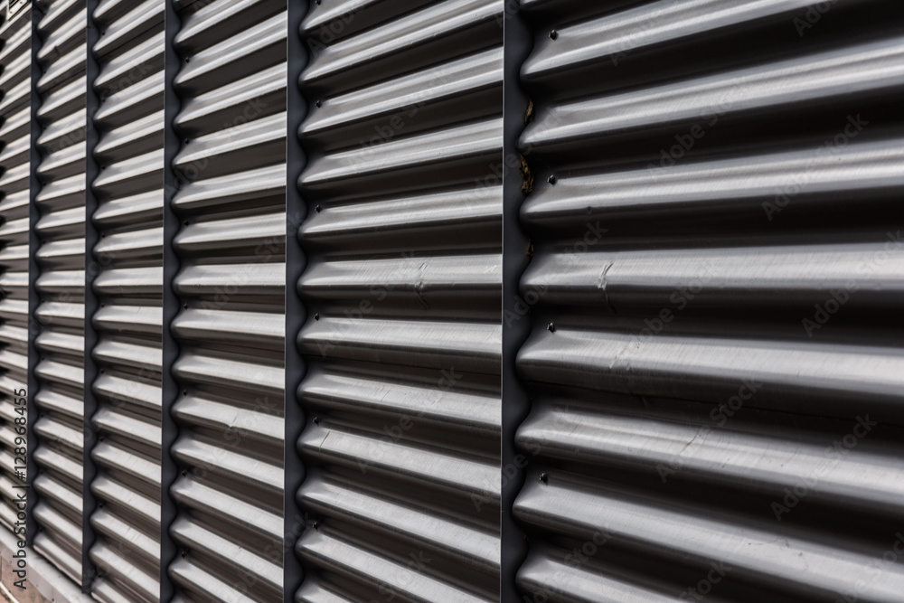 Black metal container door roll gate texture. Black metal container door roll gate texture.