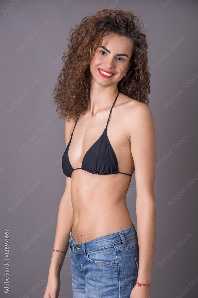 beautiful curly girl smiling, laughing, fooling around, having f beautiful curly girl smiling, laughing, fooling around, having f