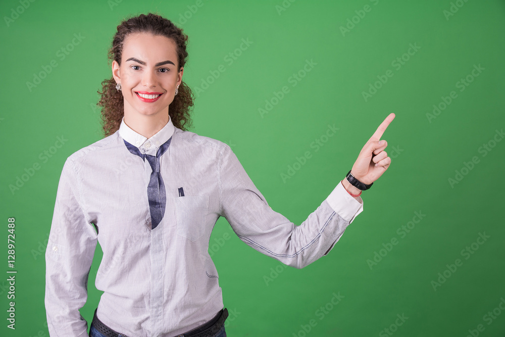 Cheerful businesswoman indicating something Cheerful businesswoman indicating something