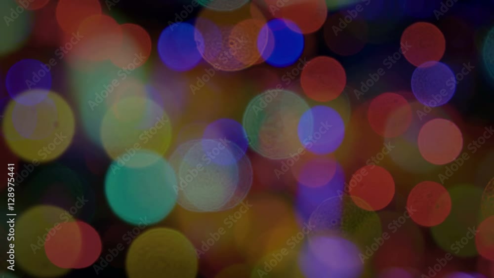 Pan across city blur background. Moving bokeh circles of night traffic.
Pan across city blur background. Moving bokeh circles of night traffic.
