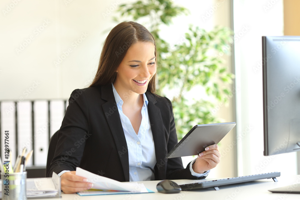 Businesswoman working on line with a tablet Businesswoman working on line with a tablet