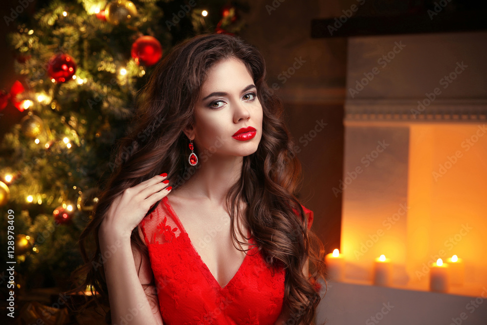 Christmas. Beautiful smiling woman. Fashion ruby earrings jewelr