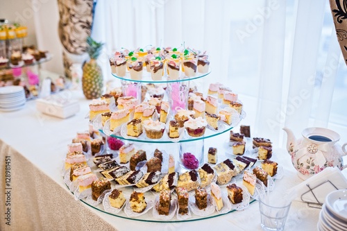 Wedding reception, table of cakes and sweet