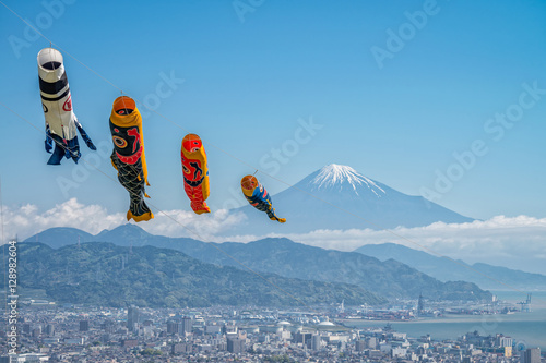 Mount Fuji with colorful carp flag on children's day in Japan.	