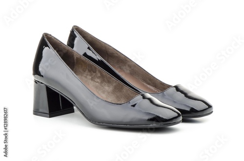 Zapatos de mujer en piel charol negra photo