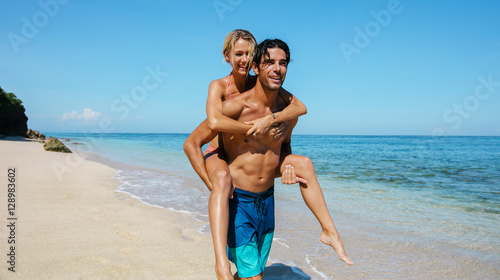 Romantic couple having fun on the beach © Jacob Lund