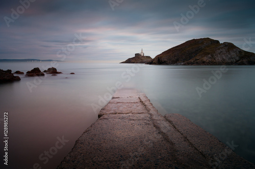 Mumbles Beach and Lighthouse
The old concrete slipway at Mumbles beach and lighthouse photo