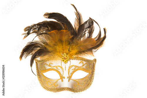 Murais de parede Pretty venetian golden carnival mask with feathers isolated on a white backgroun