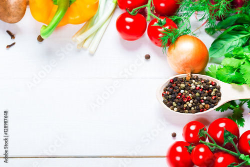 Beautiful background healthy organic eating. Studio photography the frame of different vegetables and spices on the white boards with free space for you text