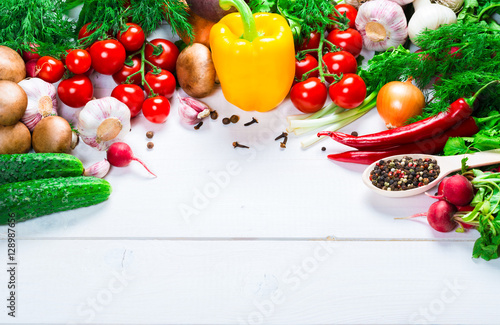 Beautiful background healthy organic eating. Studio photography the frame of different vegetables and spices on the white boards with free space for you text