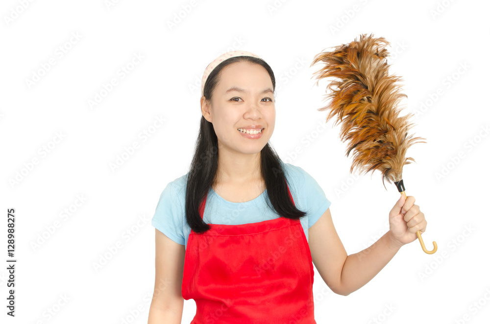 Young Asian woman wearing red apron and holding feather duster to cleaning,isolated on white background Young Asian woman wearing red apron and holding feather duster to cleaning,isolated on white background