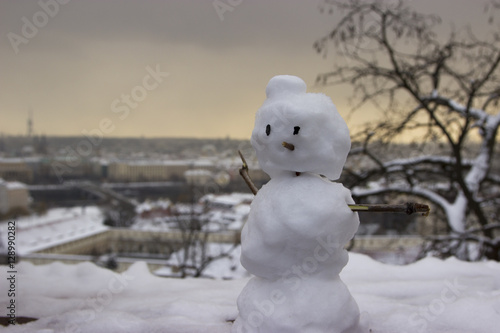 Photography Prague roof covered with snow, winter cityscape