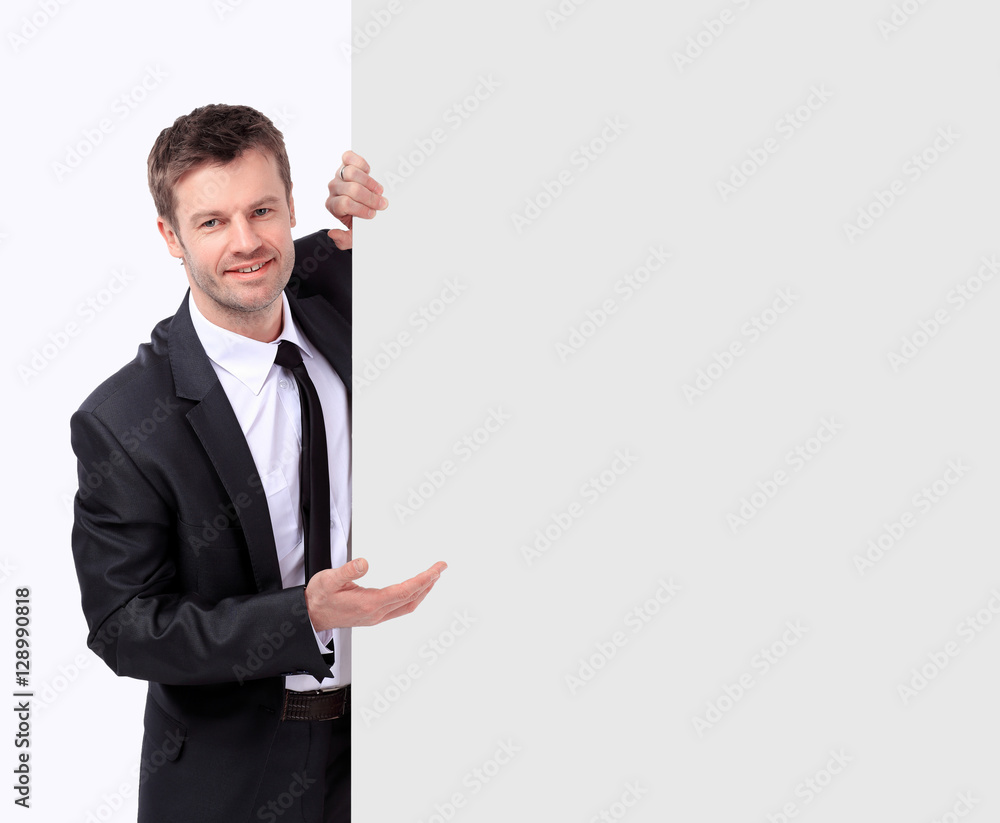 Portrait of businessman pointing at something. Portrait of businessman pointing at something.