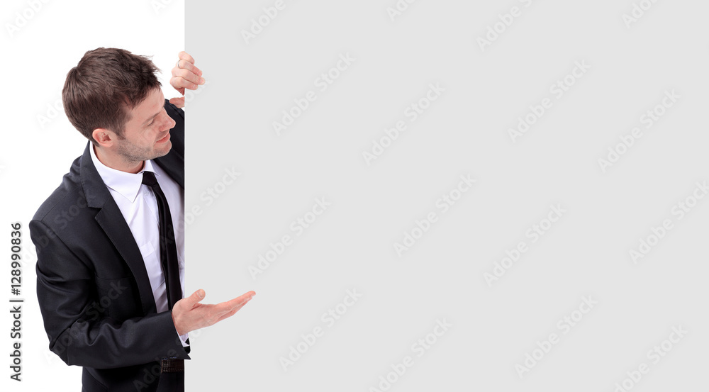 Portrait of businessman pointing at something. Portrait of businessman pointing at something.