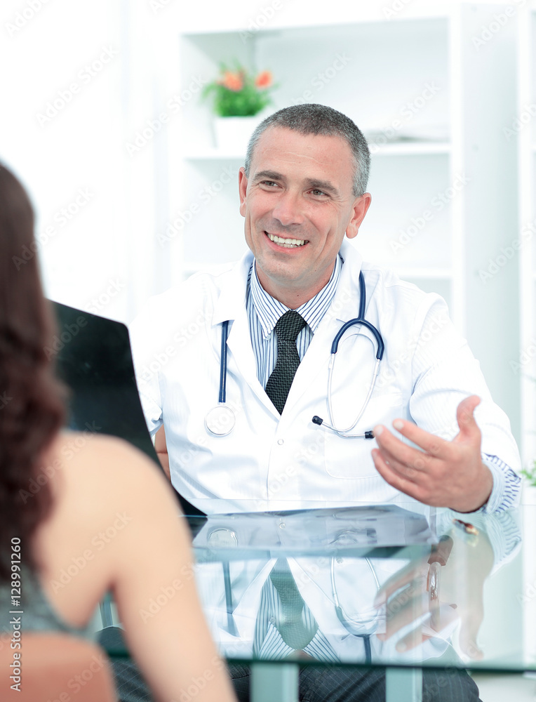 family doctor counsels the patient and discusses with her the re family doctor counsels the patient and discusses with her the re