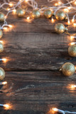 Christmas Lights and Decoration on Wooden Background. Vertical.