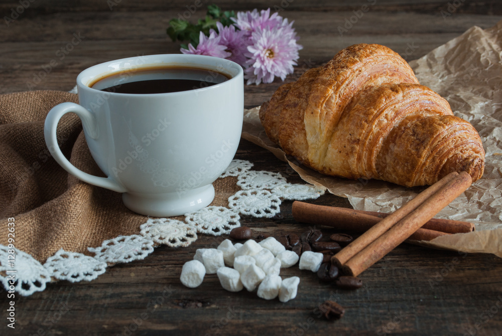 Breakfast. Coffee and croissants. Dark wood background. Horizont Breakfast. Coffee and croissants. Dark wood background. Horizont