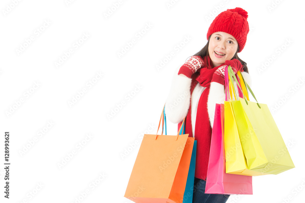 charming asian woman carry colorful shopping bags