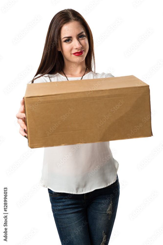 Pretty young girl holding boxes Pretty young girl holding boxes
