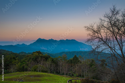 Doi Luang mountain during twilight time view from Doi Mae Taman mountain