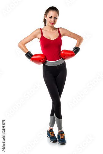 Pretty sport woman with boxing gloves © luismolinero