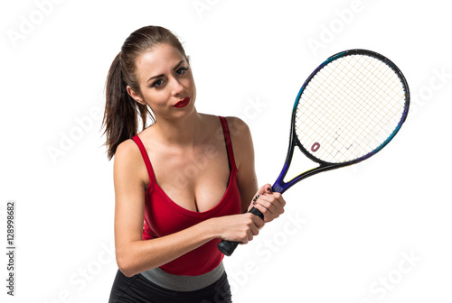 Pretty sport woman playing tennis
