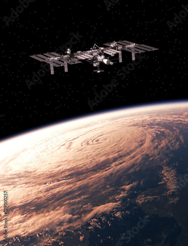 Fototapeta Naklejka Na Ścianę i Meble -  International Space Station Exploring A Hurricane On The Earth