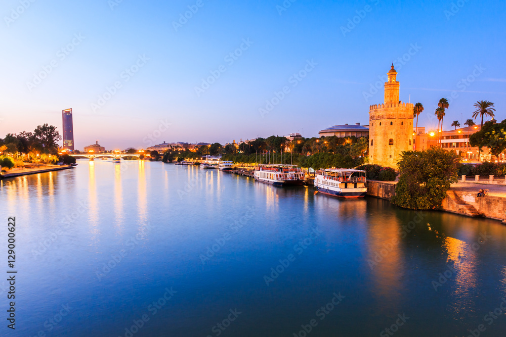 Seville, Spain. Guadalquivir river and Golden Tower (Torre del Oro)