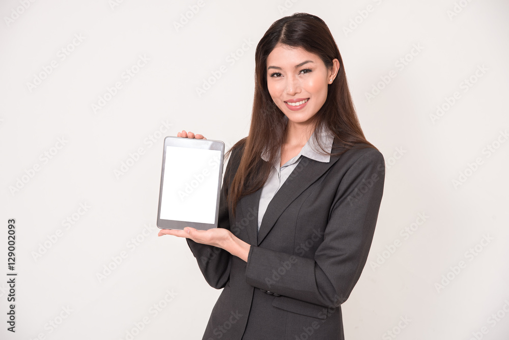 Smiling Businesswoman holding digital tablet, isolated on white Smiling Businesswoman holding digital tablet, isolated on white