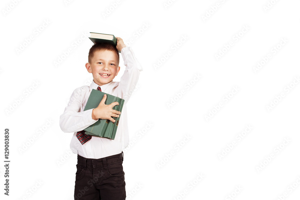 Happy School boy with books isolated on white background