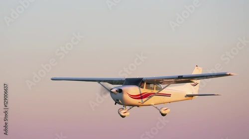 Small propeller driven airplane filmed from an other airplane flying next to it
