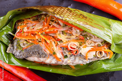 Fish curry in babana leaves. photo