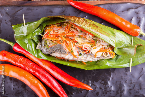 Fish curry in babana leaves. photo