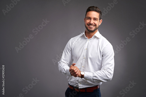 Confident young man smiling	