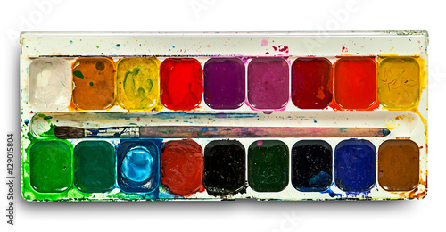 Watercolor paints set and brush photo