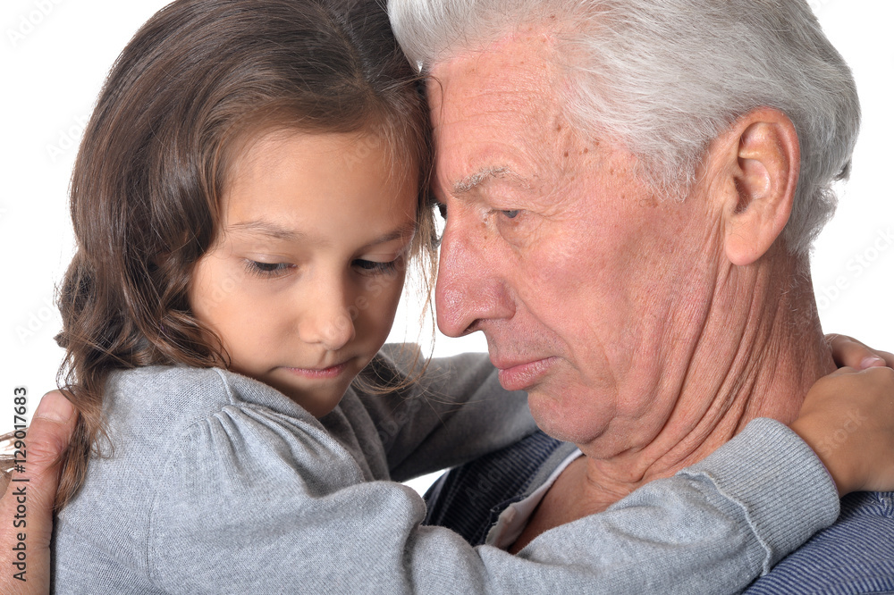Pensive grandfather and granddaughter Pensive grandfather and granddaughter