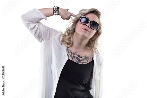 Blond woman with forefinger gun