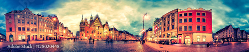 Wroclaw Market Square with Town Hall during sunset evening, Poland, Europe. Panoramic montage from 27 HDR Photos with post processing effects