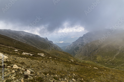 Fototapeta Naklejka Na Ścianę i Meble -  Dramatic Clouds Over Bucegi Mountains