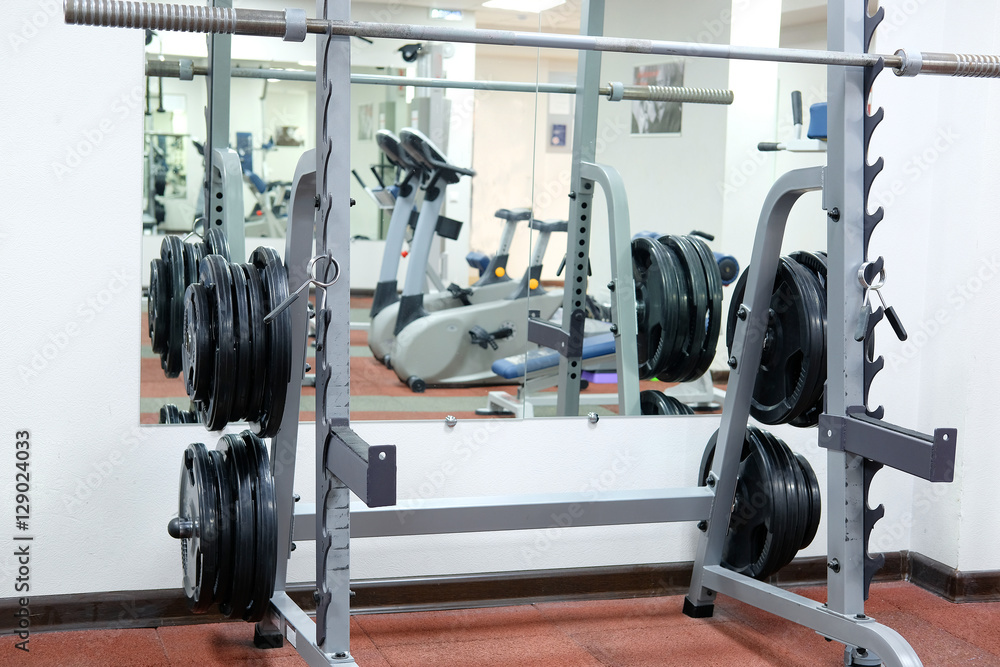 The image of wights in a fitness hall The image of wights in a fitness hall