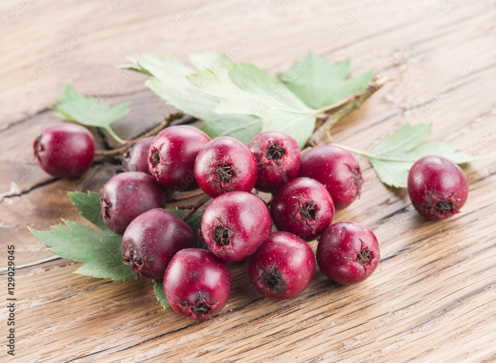 Hawthorn berries on the wooden table. Hawthorn berries on the wooden table.
