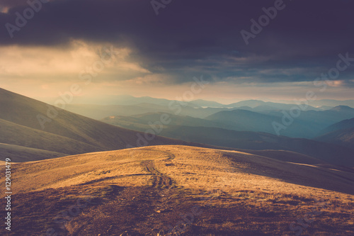 Beautiful landscape in the mountains at sunshine. Filtered image:cross processed vintage effect. 