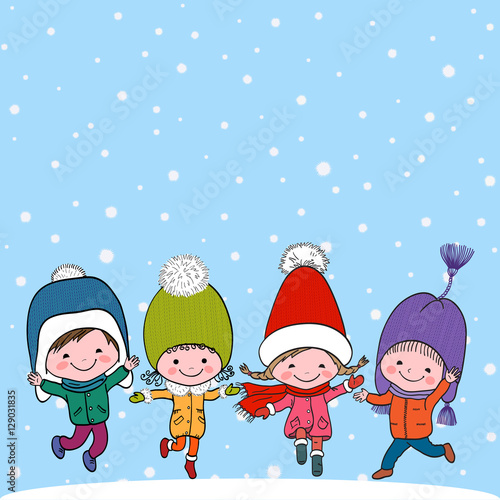Group of four happy kids on snow background photo