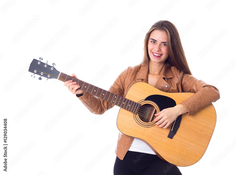 Fototapeta premium Young woman holding a guitar 