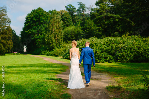 the bride and groom from behind