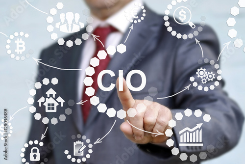CIO or chief information officer concept presented by businessman touching on virtual screen. career in IT information technology officer to administrator staff. Chief Investment Officer acronym. photo